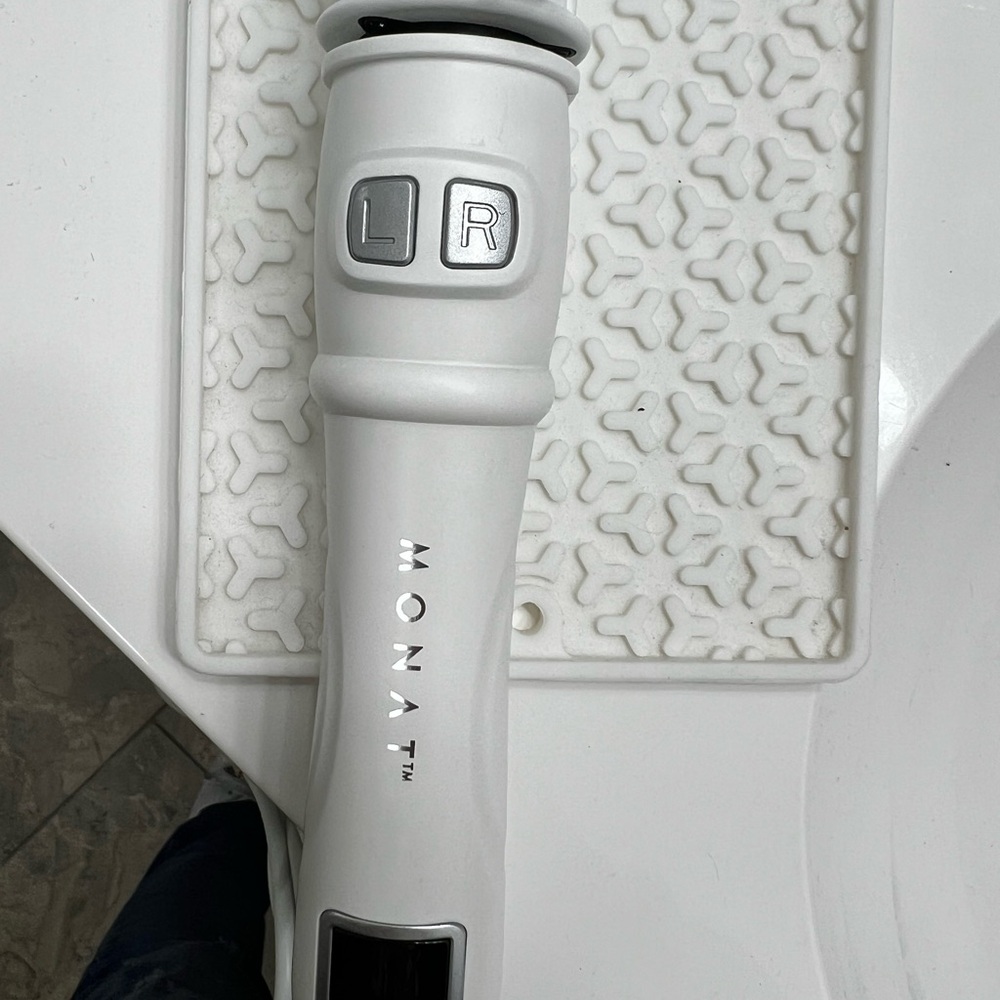 Monat 1.25 rotating curling ironing iron